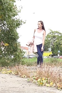 Exotic Brunette Cynthia Vellons Taking A Leek Outside