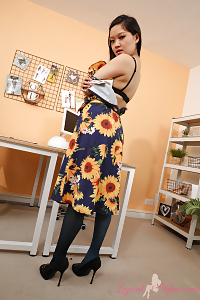 Luscious Asian Louisa Lu Posing In Compromising Pose Wearing Her Summer Dress And Stockings