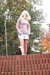 Excellent Blonde Squats On Steps Outdoors To Piss