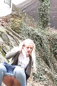 Blonde In Denims Squats Outside To Relieve Herself