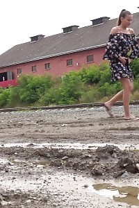 Beautiful Black-haired Yenna Squats And Pissing In A Puddle