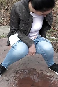 Black Haired European Relieves Pee Desperation