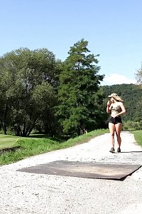 Irresistable Blonde Pisses On A Path In A Golf Course