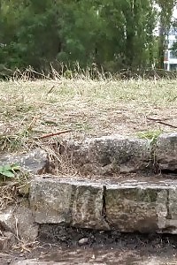 Black-haired Pisses Outside On Some Steps