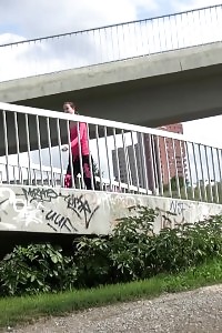 Black-haired Pulls Down Panties To Piss In Public