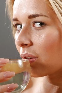 Naughty Blonde Babe Pisses Over A Banana