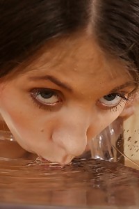 Gorgeous Brunette Dives Into A Puddle Of Her Pee