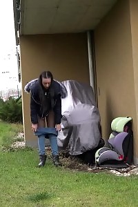 Black Haired European Squats To Piss In Public