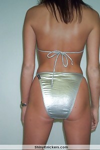 Inviting Brunette In Her Metallic Bright Thong