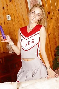 Take A Look At This Horny Cheerleader As She Crams Her Cunt With A Porn Dildo In This Naughty Cheerleader Sex